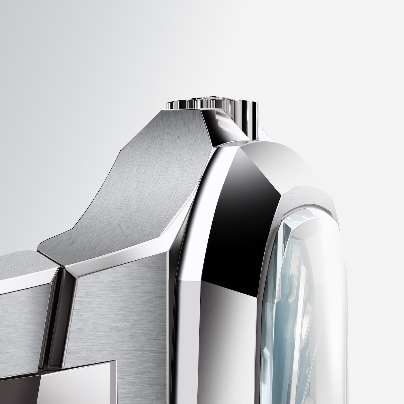 Close-up side view of stainless steel watch case showing brushed and polished facets with sapphire crystal