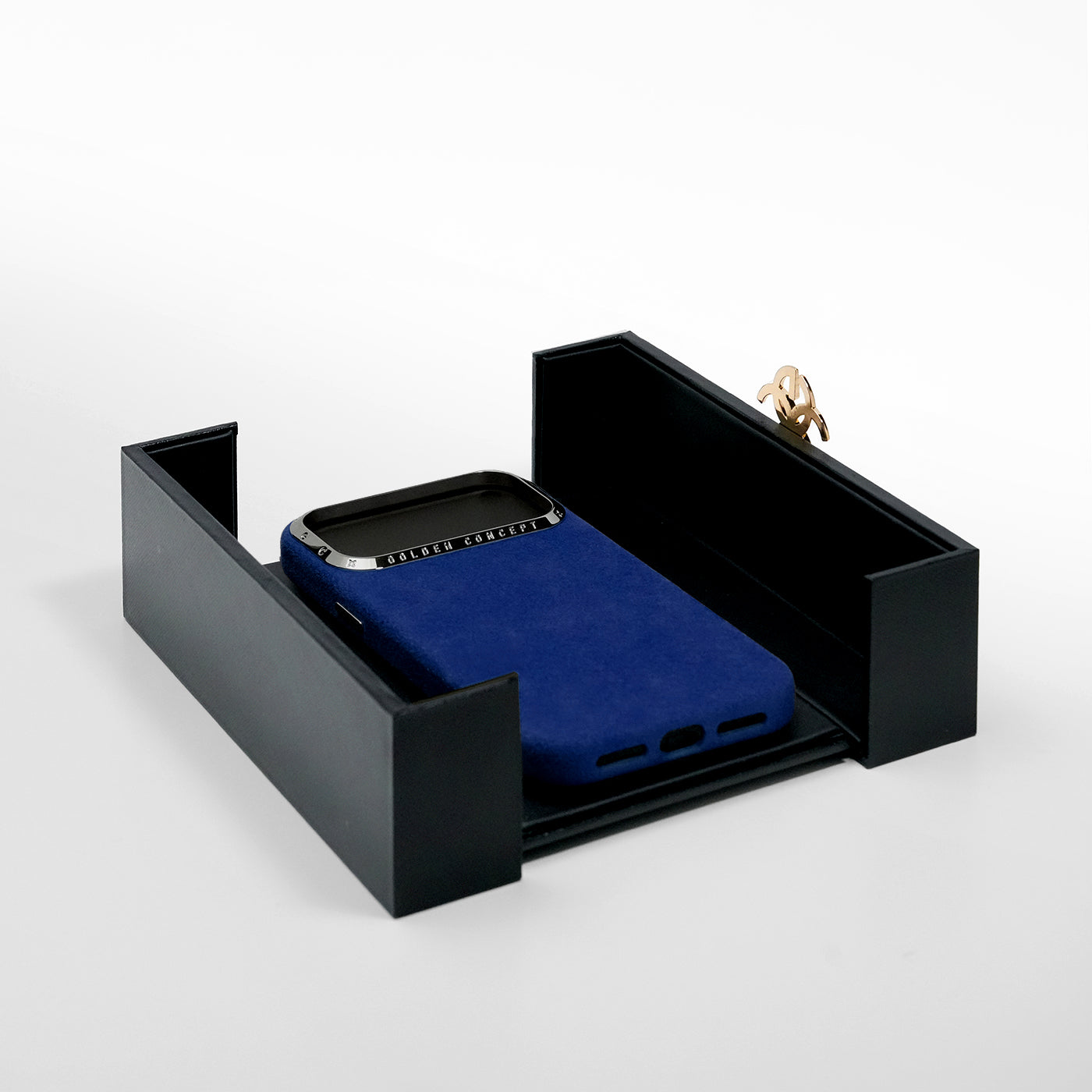 Blue Alcantara iPhone 17 case presented in Golden Concept box
