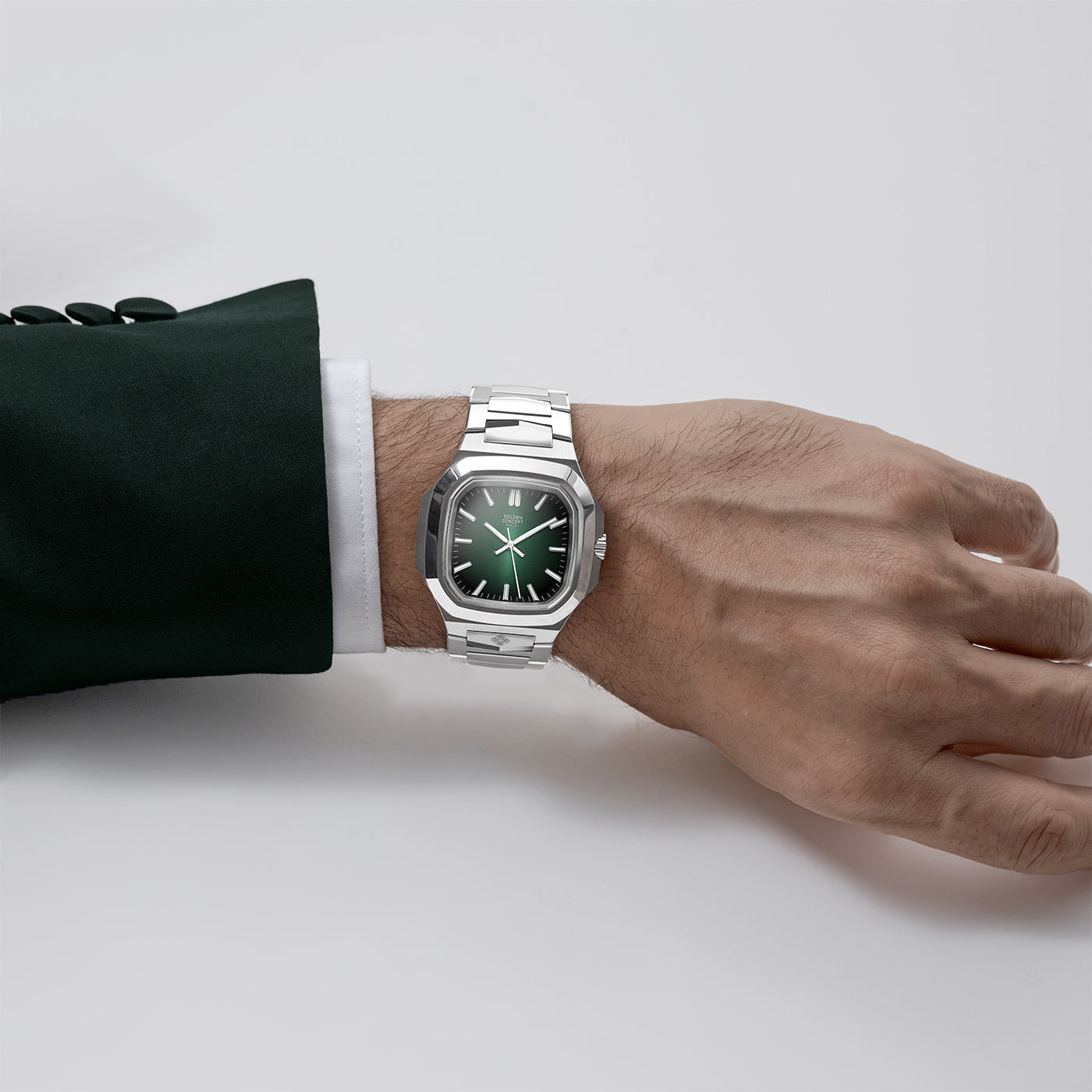 Wrist shot of Golden Concept automatic watch with green gradient sunburst dial and stainless steel bracelet
